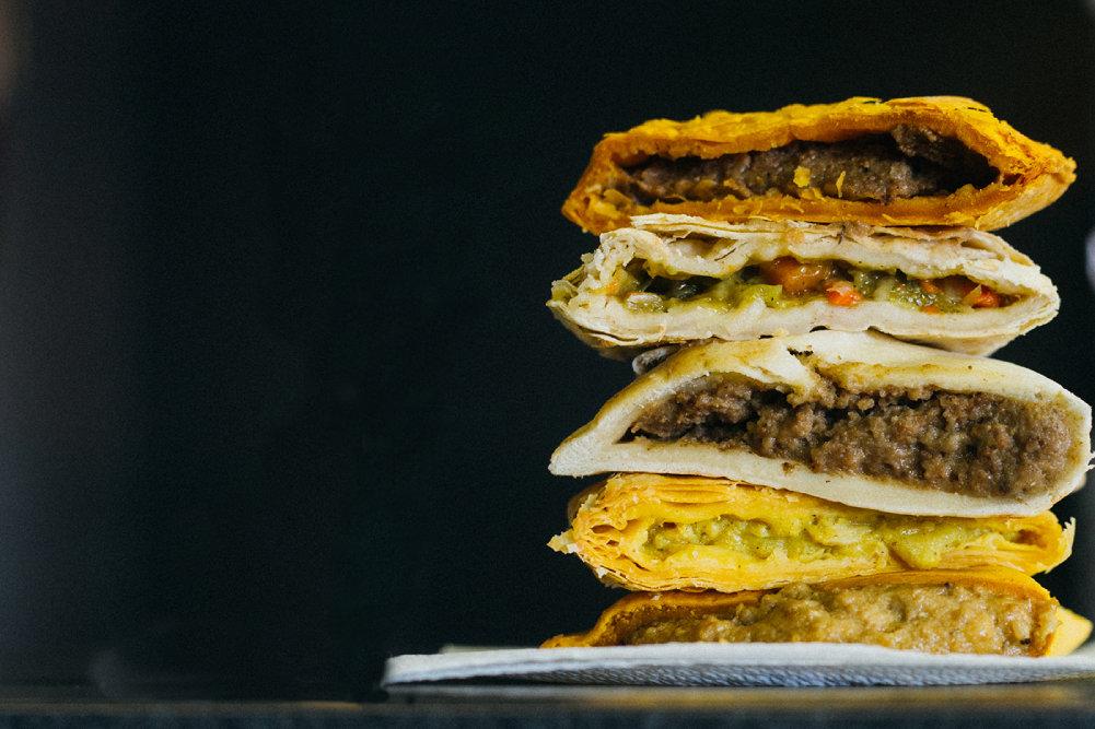 The restaurant serves a variety of Jamaican patty sandwiches, as well as vegan options and a catering menu.